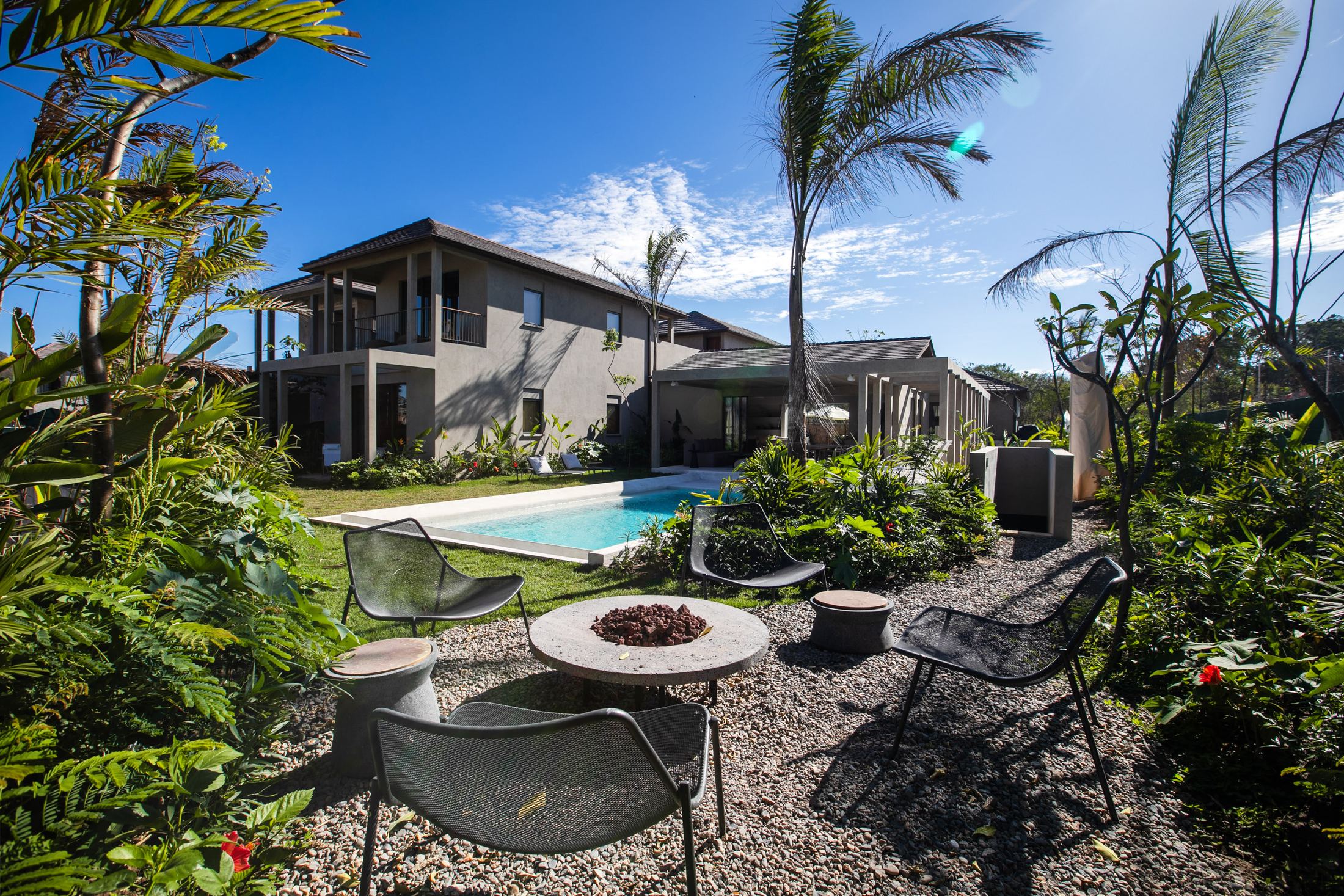 Villa exterior with private pool and tropical garden at Selva, Punta Mita